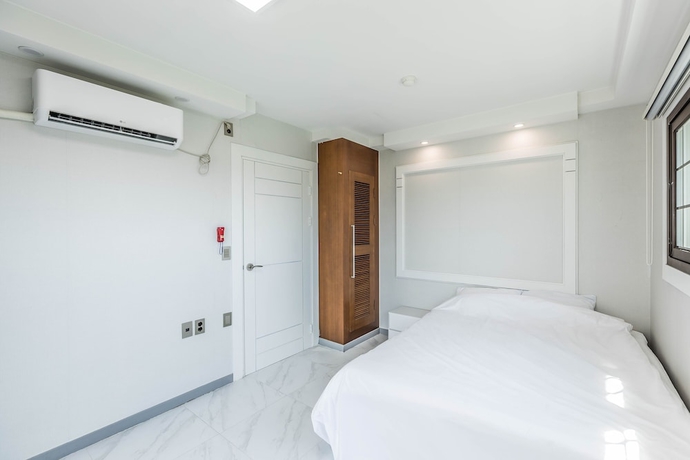 Imagen de la habitación del Hotel Monaco Pool Pension. Foto 16