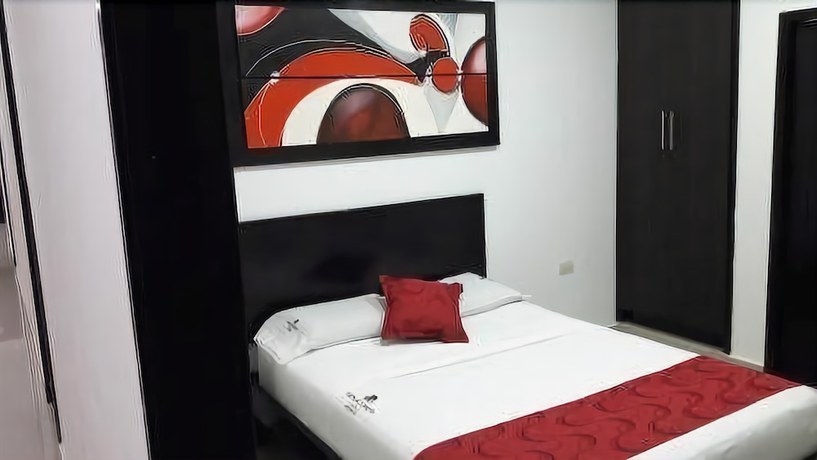 Imagen de la habitación del Hotel Monaco Real. Foto 12