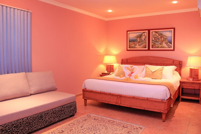 Imagen de la habitación del Hotel Monaco Suites De Boracay. Foto 4