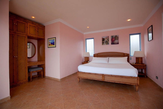 Imagen de la habitación del Hotel Monaco Suites De Boracay. Foto 6