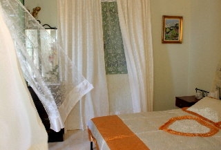 Imagen de la habitación del Hotel Monambeles Villas. Foto 8