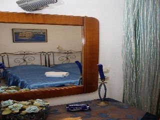 Imagen de la habitación del Hotel Monambeles Villas. Foto 14