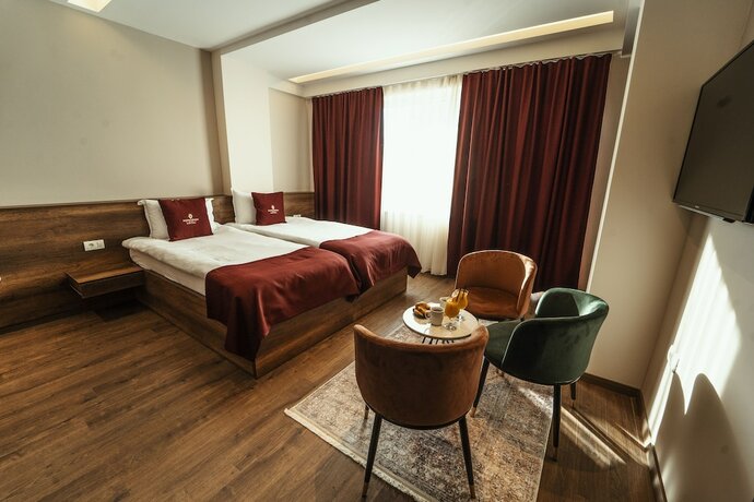 Imagen de la habitación del Hotel Monarch, Prizren. Foto 7