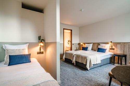 Imagen de la habitación del Hotel Monasterium Poortackere. Foto 2