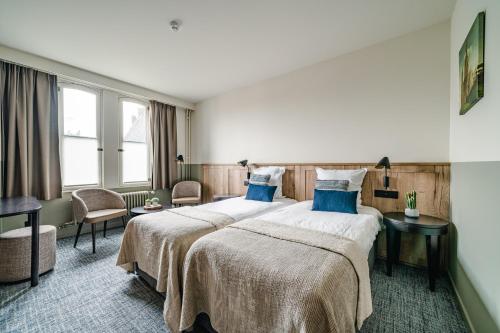 Imagen de la habitación del Hotel Monasterium Poortackere. Foto 3