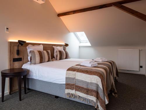 Imagen de la habitación del Hotel Monasterium Poortackere. Foto 9