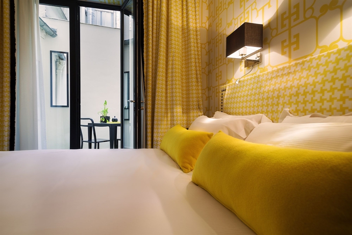 Imagen de la habitación del Hotel Monceau Elysées. Foto 12