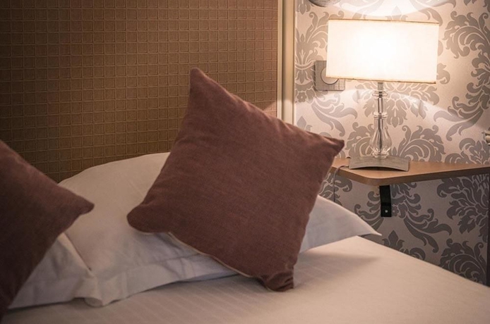 Imagen de la habitación del Hotel Monceau Wagram. Foto 12