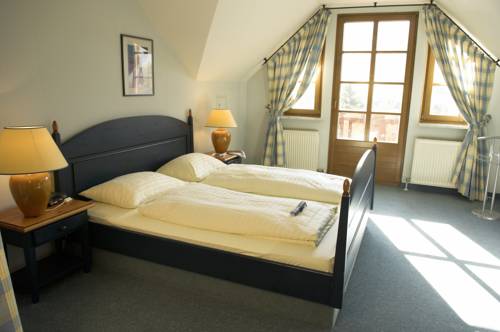 Imagen de la habitación del Hotel Mondi Holiday Seeblickhotel Grundlsee. Foto 6