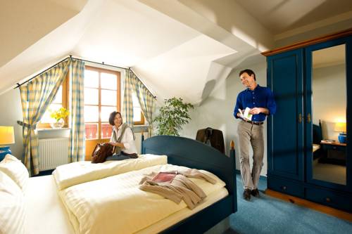 Imagen de la habitación del Hotel Mondi Holiday Seeblickhotel Grundlsee. Foto 11