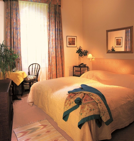 Imagen de la habitación del Hotel Mondial Appartement. Foto 9