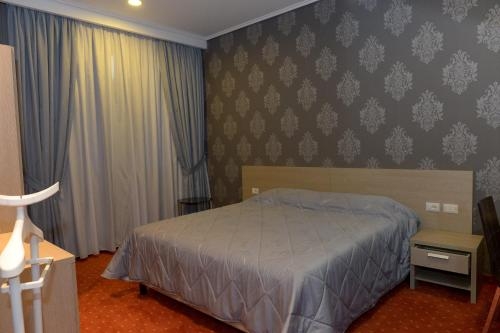 Imagen de la habitación del Hotel Mondial Boutique. Foto 8