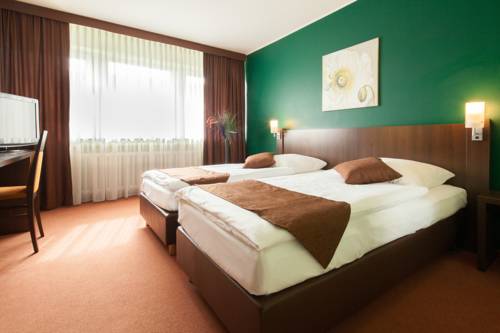 Imagen de la habitación del Hotel Mondial, Monheim am Rhein. Foto 4