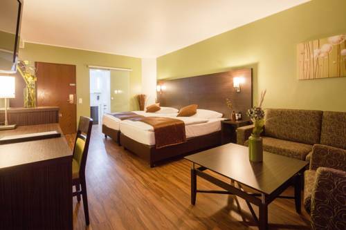 Imagen de la habitación del Hotel Mondial, Monheim am Rhein. Foto 5