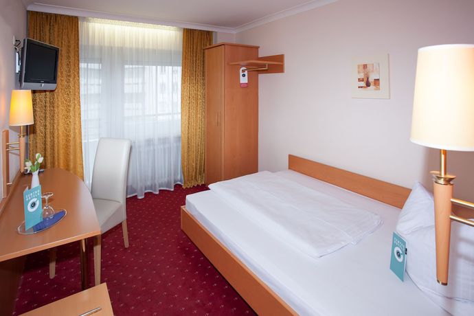 Imagen de la habitación del Hotel Mondial Munich. Foto 9