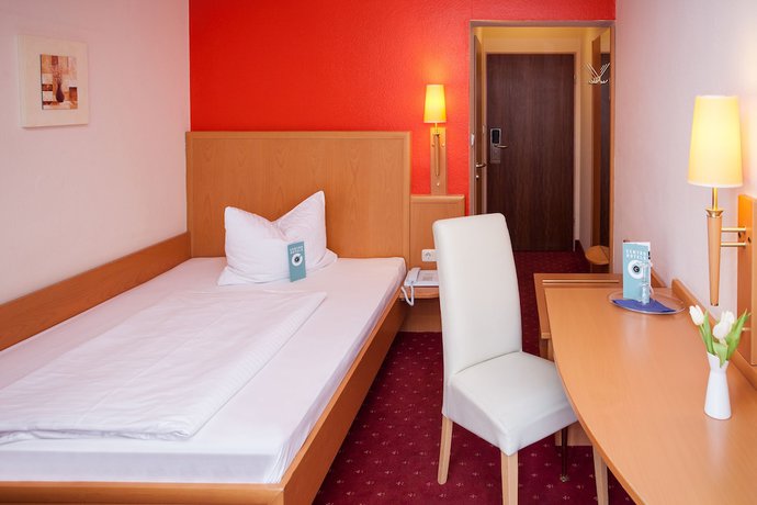 Imagen de la habitación del Hotel Mondial Munich. Foto 10