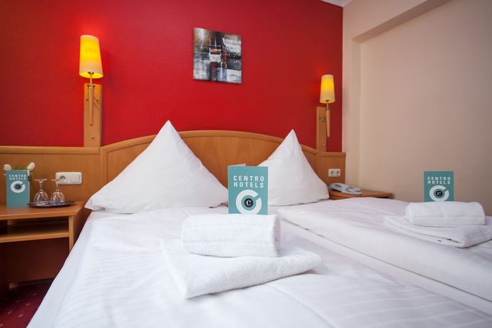 Imagen de la habitación del Hotel Mondial Munich. Foto 14
