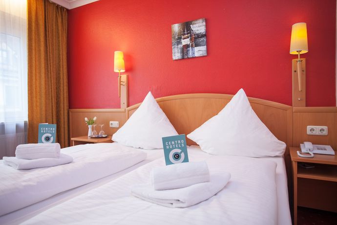 Imagen de la habitación del Hotel Mondial Munich. Foto 15