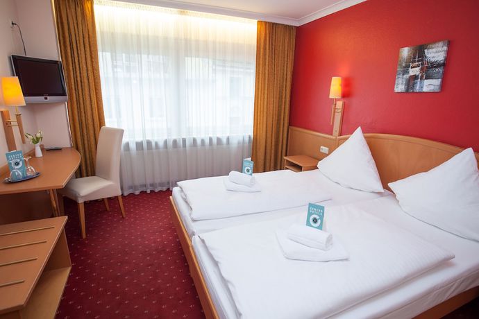 Imagen de la habitación del Hotel Mondial Munich. Foto 16