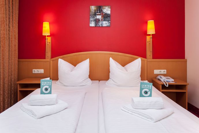 Imagen de la habitación del Hotel Mondial Munich. Foto 17