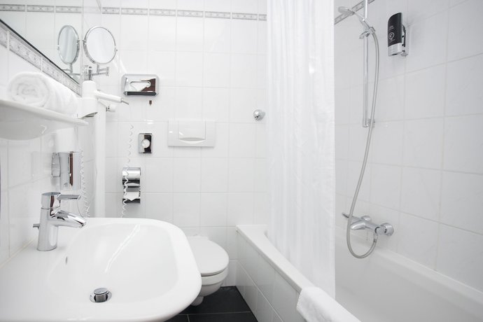 Imagen de la habitación del Hotel Mondial Munich. Foto 18