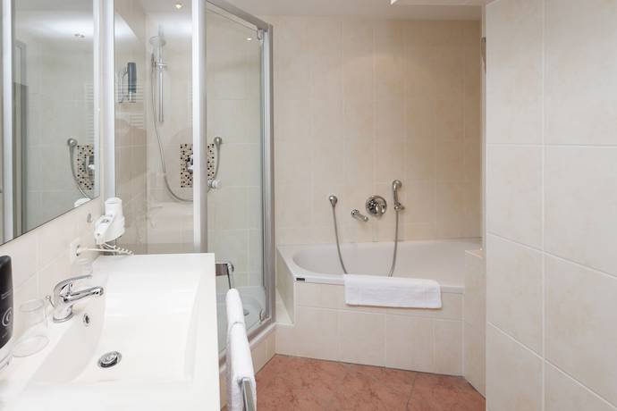 Imagen de la habitación del Hotel Mondial Munich. Foto 19