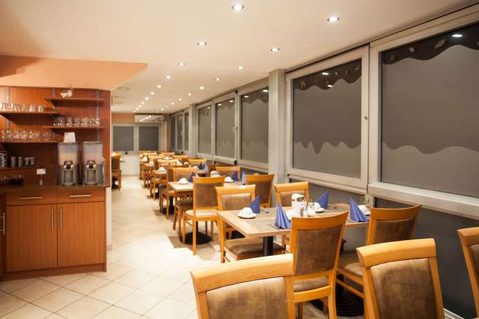 Imagen del bar/restaurante del Hotel Mondial Munich. Foto 6