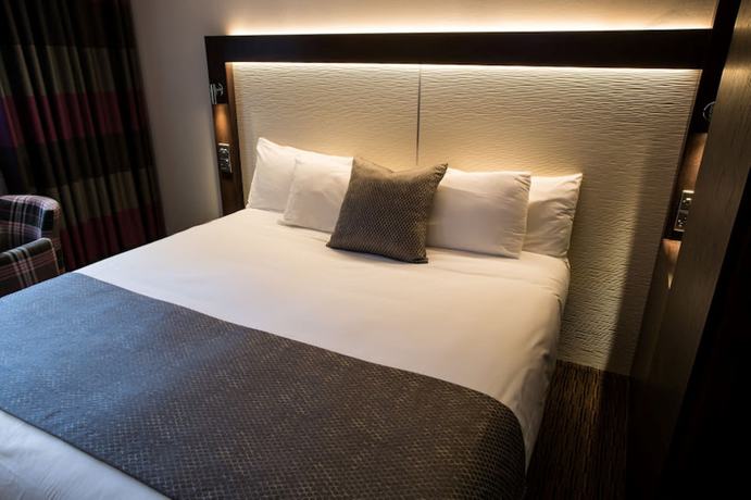 Imagen de la habitación del Hotel Mondo Hotel. Foto 9