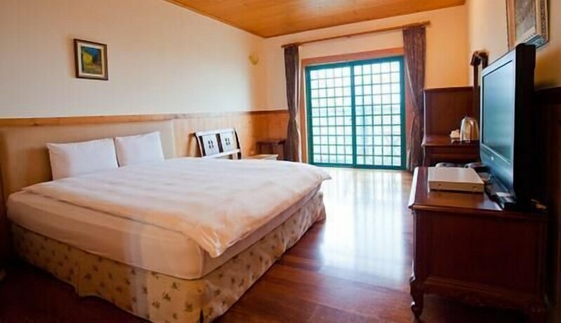 Imagen de la habitación del Hotel Mone Garden Resort. Foto 11