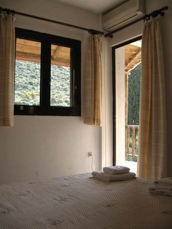 Imagen de la habitación del Hotel Monemvasia Green Apartments. Foto 14