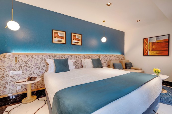 Imagen de la habitación del Hotel Monicca Collection Oura View Suites. Foto 2