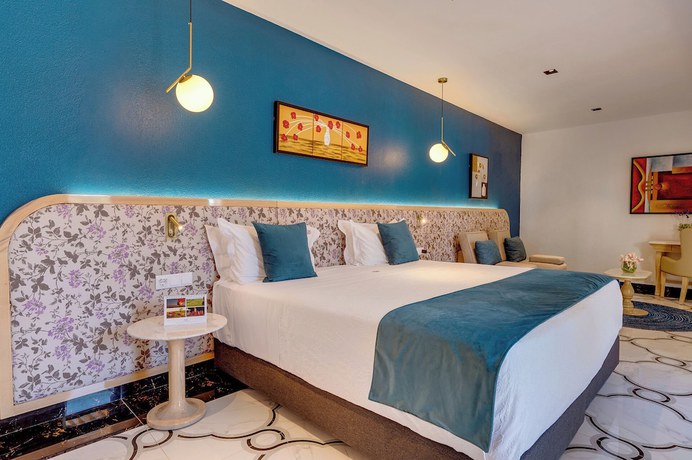 Imagen de la habitación del Hotel Monicca Collection Oura View Suites. Foto 4