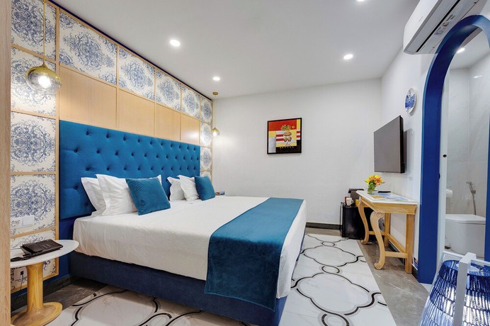 Imagen de la habitación del Hotel Monicca Collection Oura View Suites. Foto 9