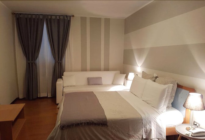 Imagen de la habitación del Hotel Moniga. Foto 17