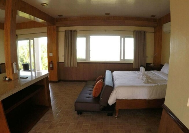 Imagen de la habitación del Hotel Monkey Beach Dive Resort. Foto 14
