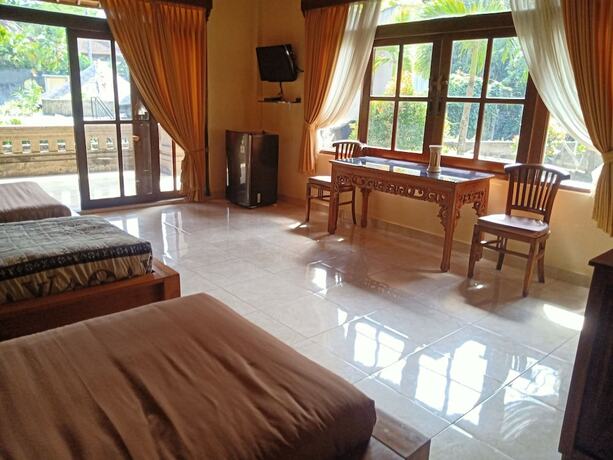 Imagen de la habitación del Hotel Monkey Forest Bungalow. Foto 21