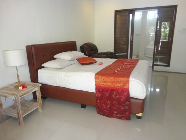 Imagen de la habitación del Hotel Monkey Forest Bungalow. Foto 26