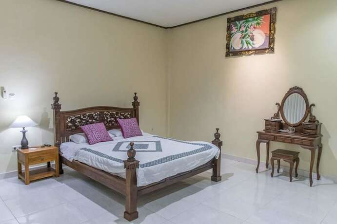 Imagen de la habitación del Hotel Monkey Forest Bungalow. Foto 30