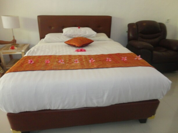 Imagen de la habitación del Hotel Monkey Forest Bungalow. Foto 31