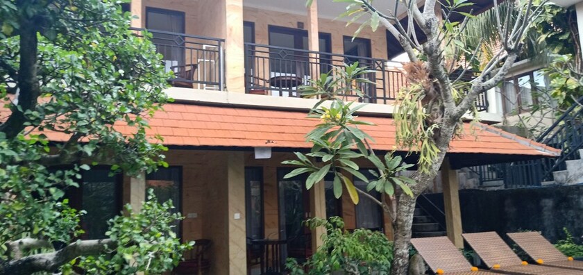 Imagen de la habitación del Hotel Monkey Forest Bungalow. Foto 34