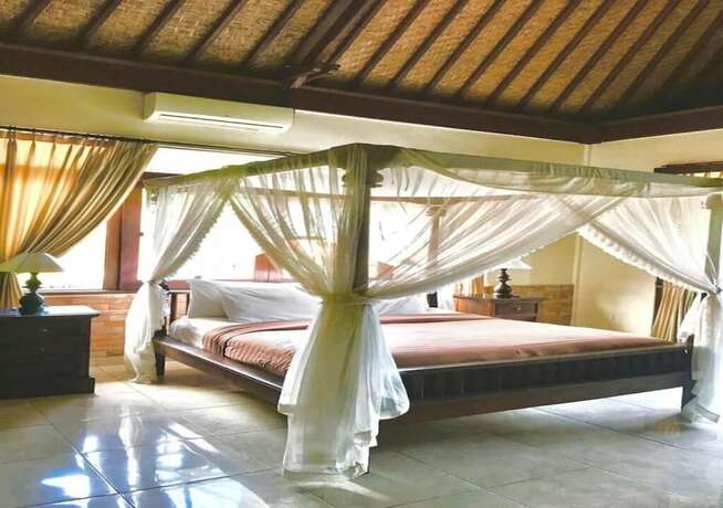 Imagen de la habitación del Hotel Monkey Forest Bungalow. Foto 36