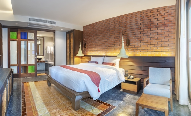 Imagen de la habitación del Hotel Monkham Village Hatyai. Foto 3