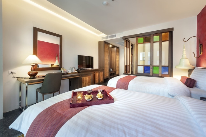 Imagen de la habitación del Hotel Monkham Village Hatyai. Foto 4