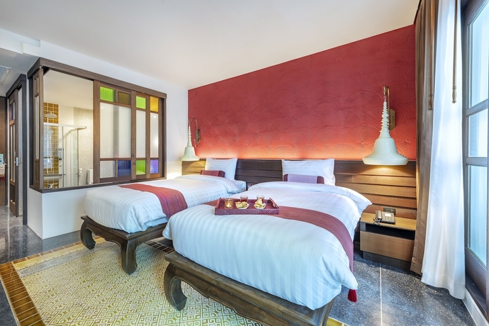 Imagen de la habitación del Hotel Monkham Village Hatyai. Foto 5