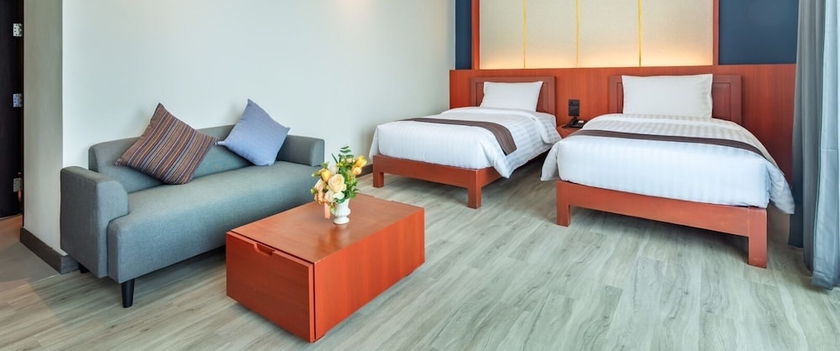 Imagen de la habitación del Hotel Monkham Village Hatyai. Foto 6