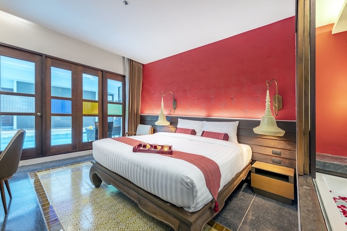 Imagen de la habitación del Hotel Monkham Village Hatyai. Foto 10