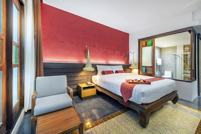 Imagen de la habitación del Hotel Monkham Village Hatyai. Foto 11