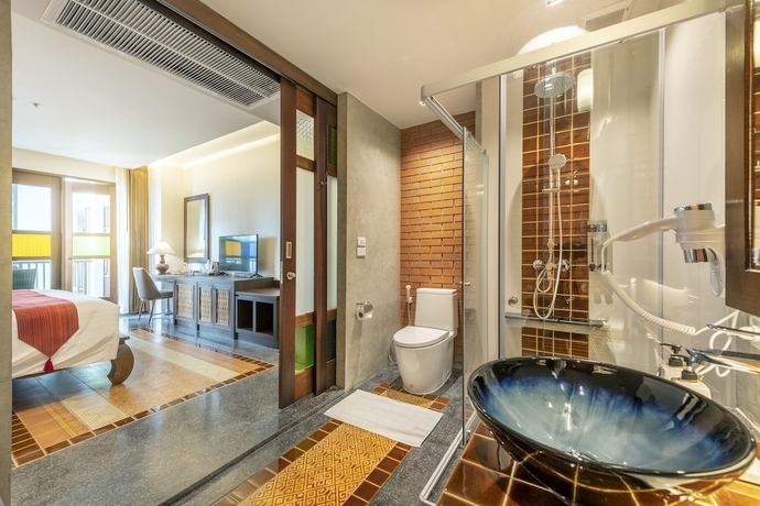 Imagen de la habitación del Hotel Monkham Village Hatyai. Foto 12