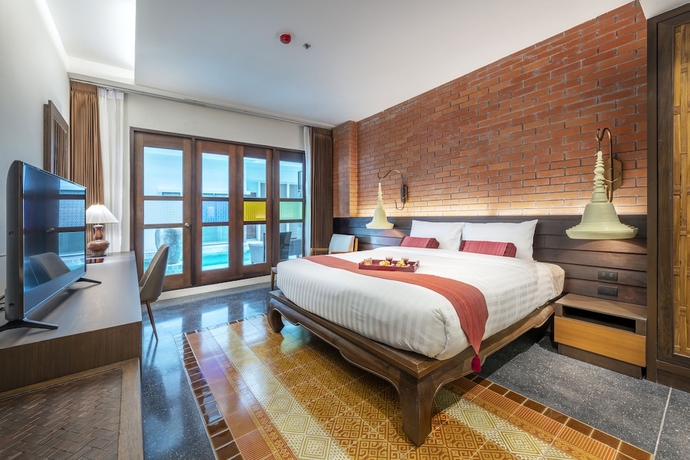 Imagen de la habitación del Hotel Monkham Village Hatyai. Foto 13