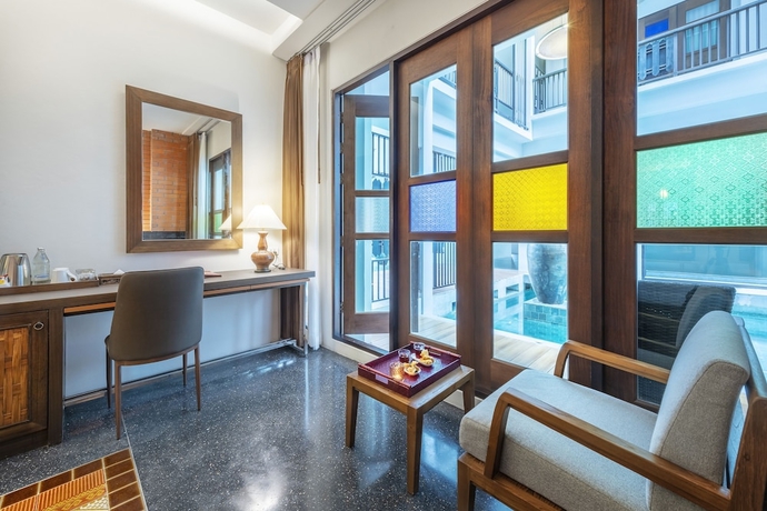 Imagen de la habitación del Hotel Monkham Village Hatyai. Foto 15